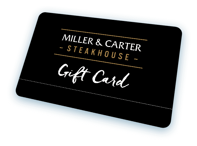 A black Miller & Carter gift card with gold and white writing, set against a white background.