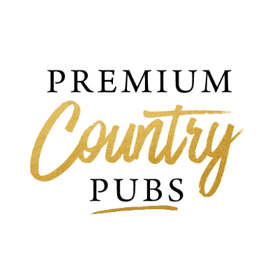 The Premium Country Pubs logo. 'Premium' and 'Pubs' are written in a bold, serif font, while 'Country' is scrawled in gold in the centre. Underneath 'Pubs' is a gold underline.