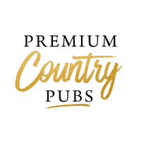 The Premium Country Pubs logo. 'Premium' and 'Pubs' are written in a bold, serif font, while 'Country' is scrawled in gold in the centre. Underneath 'Pubs' is a gold underline.