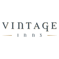 The Vintage Inns logo. 'Vintage' is written in a serif font with a golden shadow. Underneath, 'Inns' is written between two lines of gold.