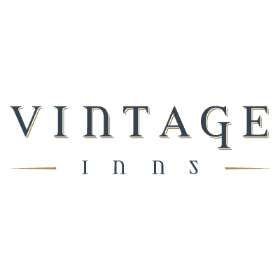 The Vintage Inns logo. 'Vintage' is written in a serif font with a golden shadow. Underneath, 'Inns' is written between two lines of gold.