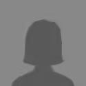 A placeholder icon for a team member, with an assumed female silhouette on a dark grey background.