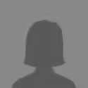 A placeholder icon for a team member, with an assumed female silhouette on a dark grey background.