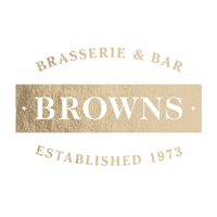 On the Browns' logo, "Brasserie & Bar" is written above "BROWNS". Below it says "Established 1973". All are written in a textured gold style.